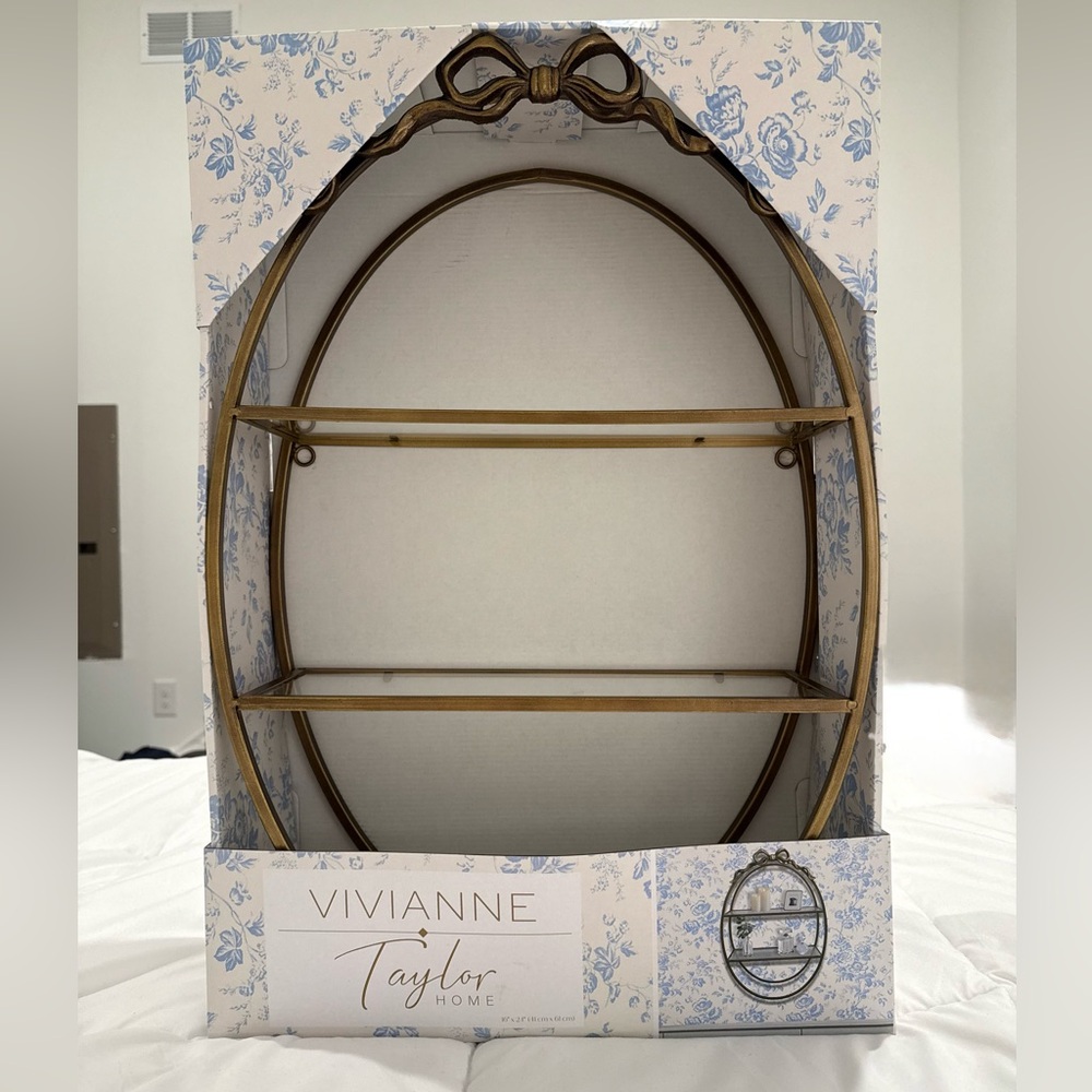 Vivianne Taylor Gold Oval Wall Shelf